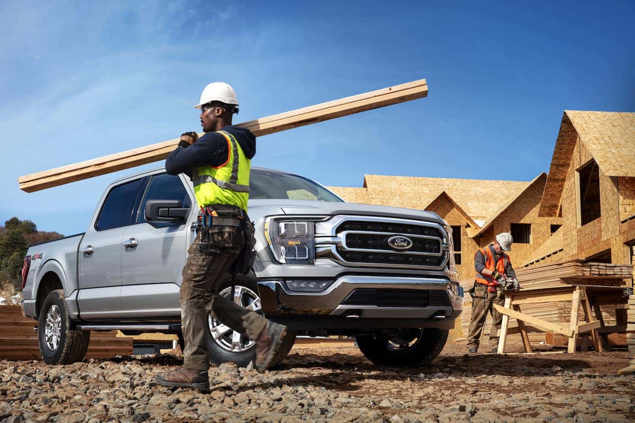 Ford F-150 PowerBoost Hybrid supplying power at a construction job site
