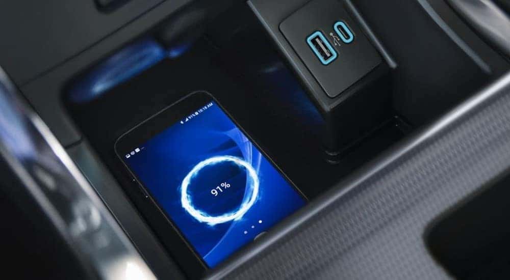 A phone is shown charging in a 2024 Ford Edge.