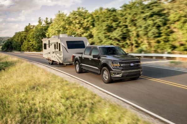 Black 2025 Ford F-150 Towing RV