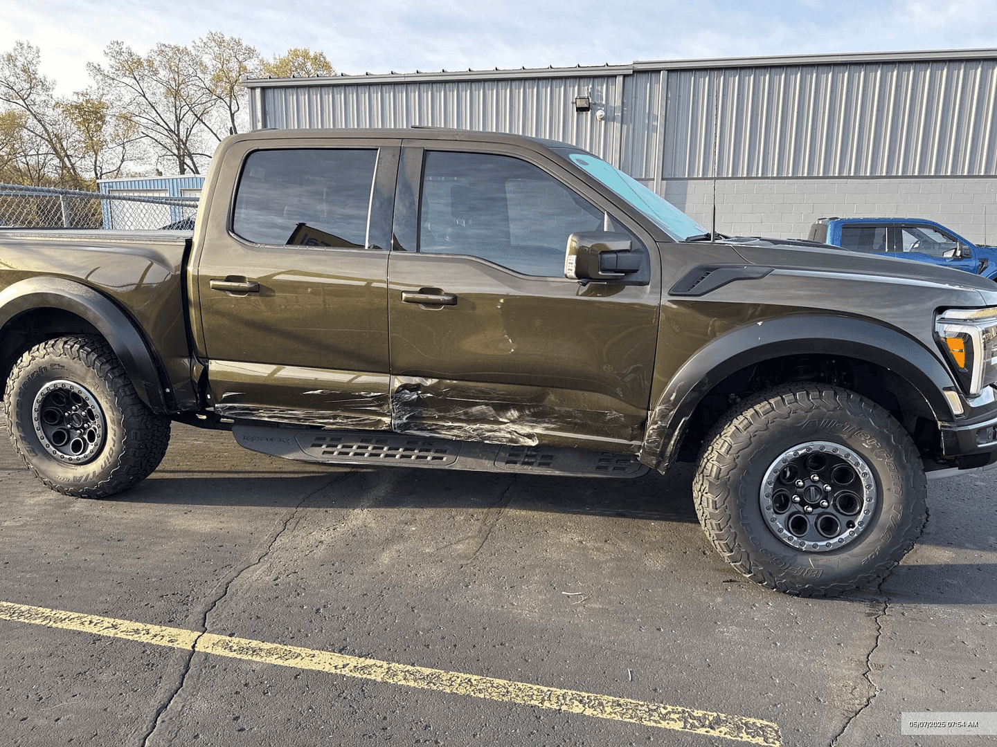 side view of damaged truck