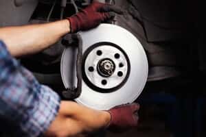 Person changing brakes