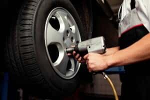 Person changing a tire