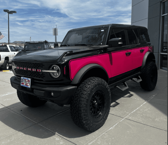 2025 Ford Bronco Outer Banks pink edition lifted SUV with Black accents at Castle Rock Ford