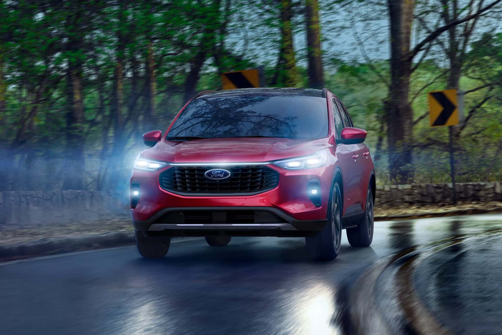 2026 Ford Escape driving in the forest