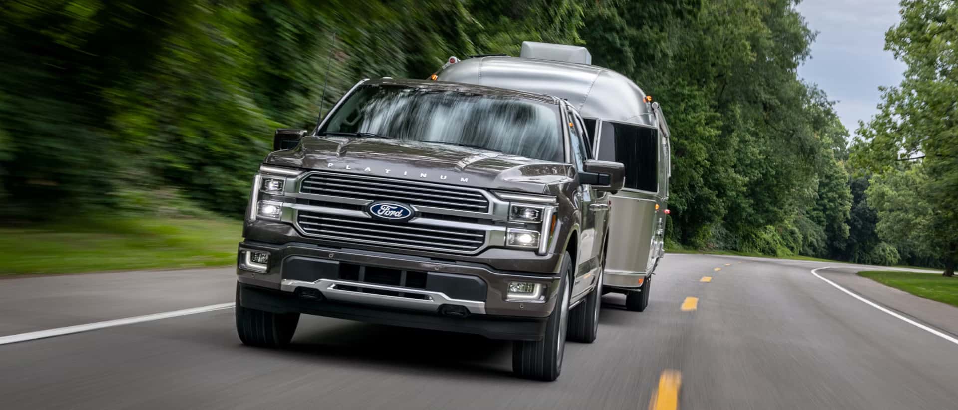 a 2026 Ford F-150 hauling a trailer