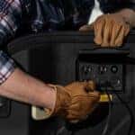 Ben Westby Plugging A Cord Into His Electric Ford F-150 Lightning