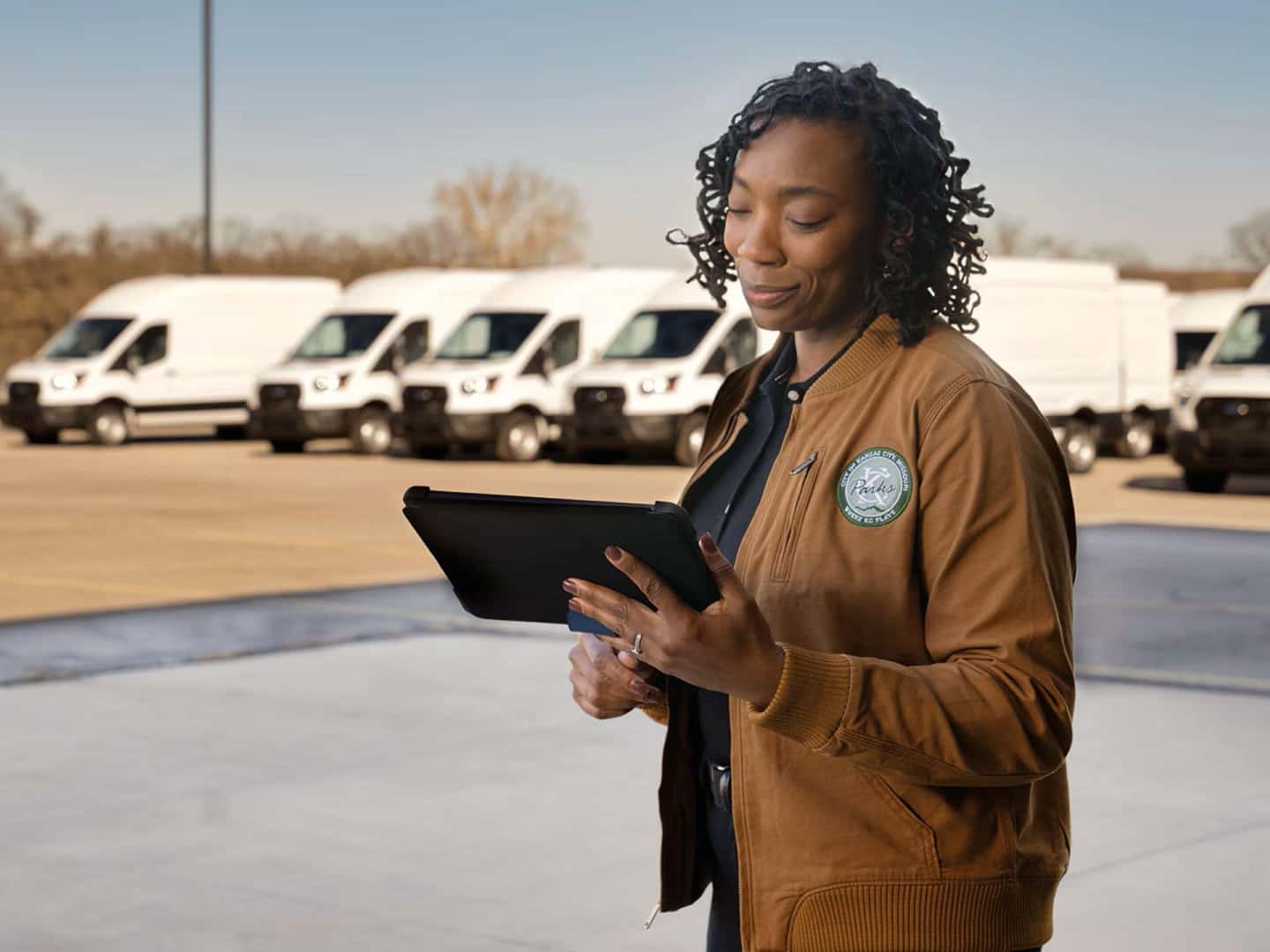 Working Holding tablet with Fleet in Background