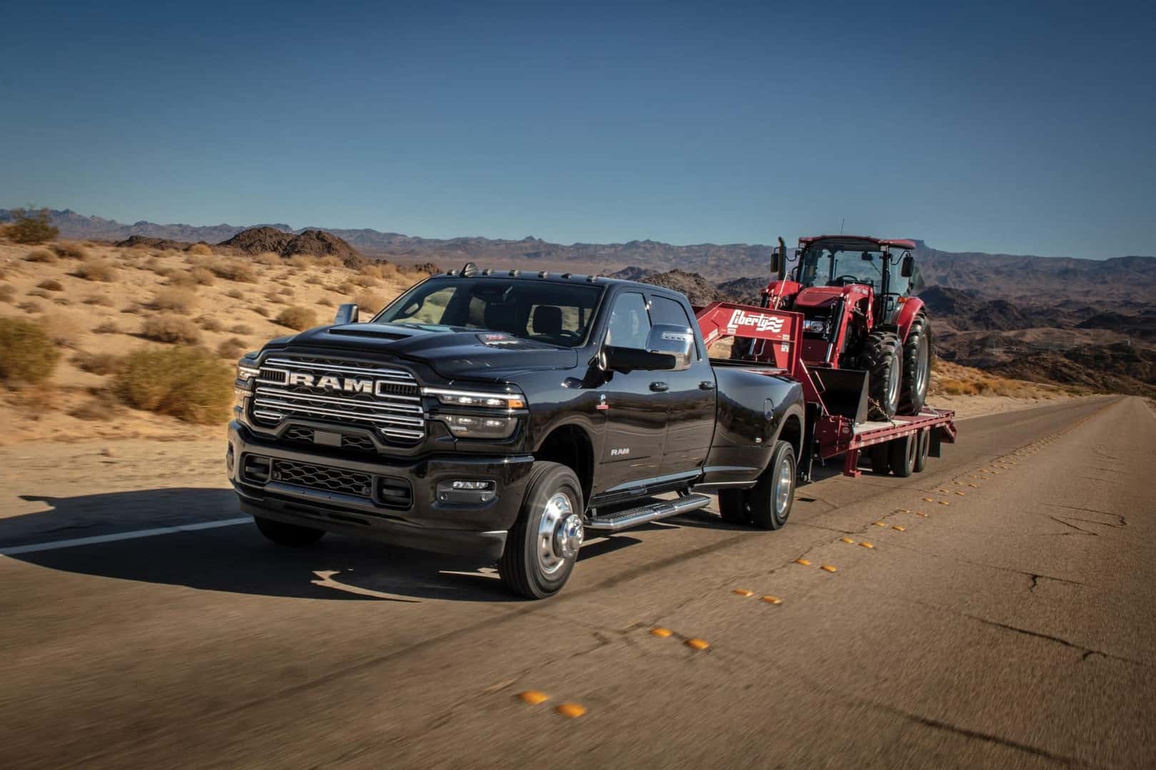 2025 Ram 2500 Towing Machinery In Its Trailer