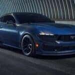 2024 Ford Mustang GT driving through a tunnel