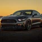 2024 Ford Mustang in front of a sunset