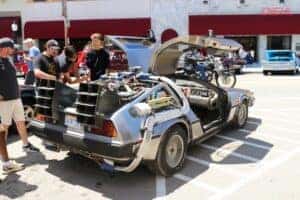 people looking car from the film back to the future at the beaver falls car cruise