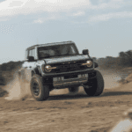 Ford Raptor driving in the gravel
