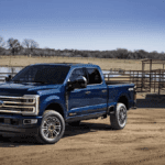2024 Ford Super Duty Platinum Plus parked on a farm