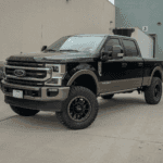 2024 Ford F-150 Super Duty parked at a grocery store loading dock