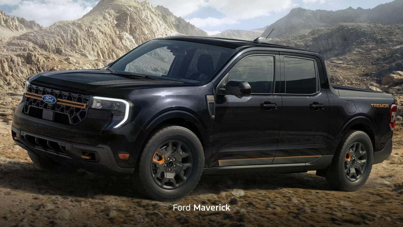 Black Ford Maverick Tremor shown from a front three-quarter angle on rugged mountain terrain.