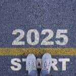 Runner standing at the starting point with 2025 year for starting in new year 2025 to achieve business planing and success concept.
