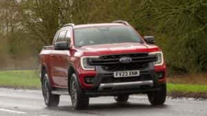 2023 red diesel engine Ford Ranger wildtrak ecoblue car driving on an English road