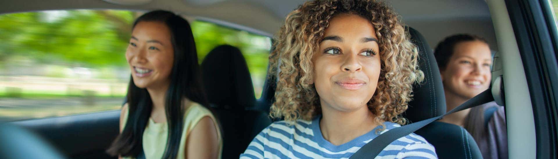 First Time Buyers driving off in their new vehicle