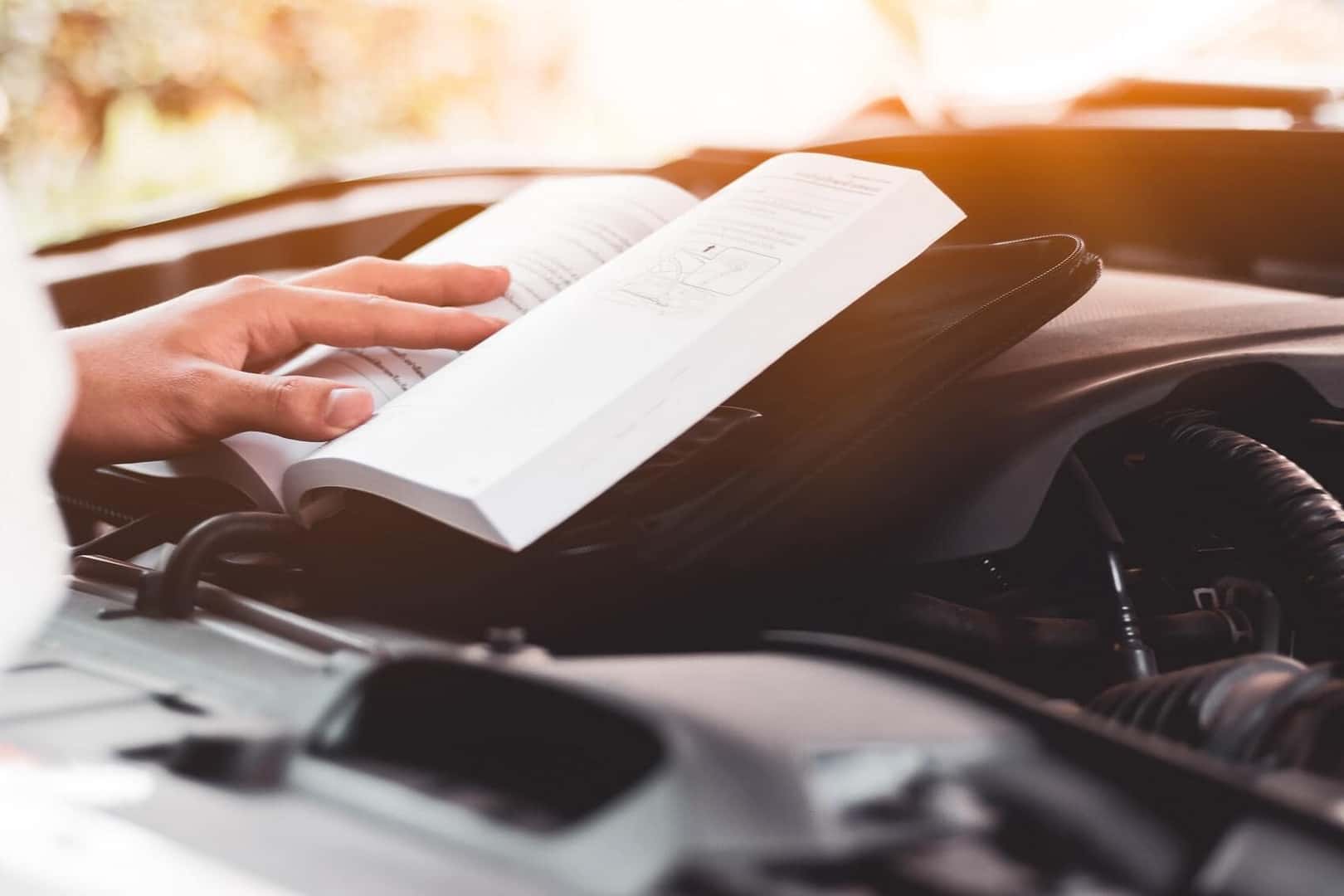 Reading car owner's manual