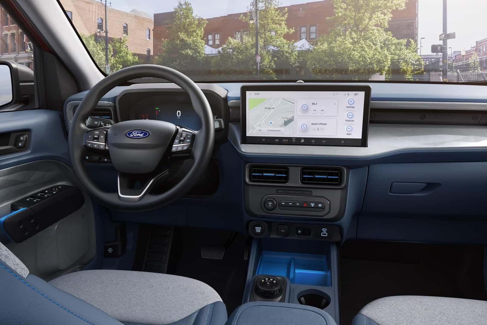 Close up of the front wheel and dashboard inside the Ford Maverick
