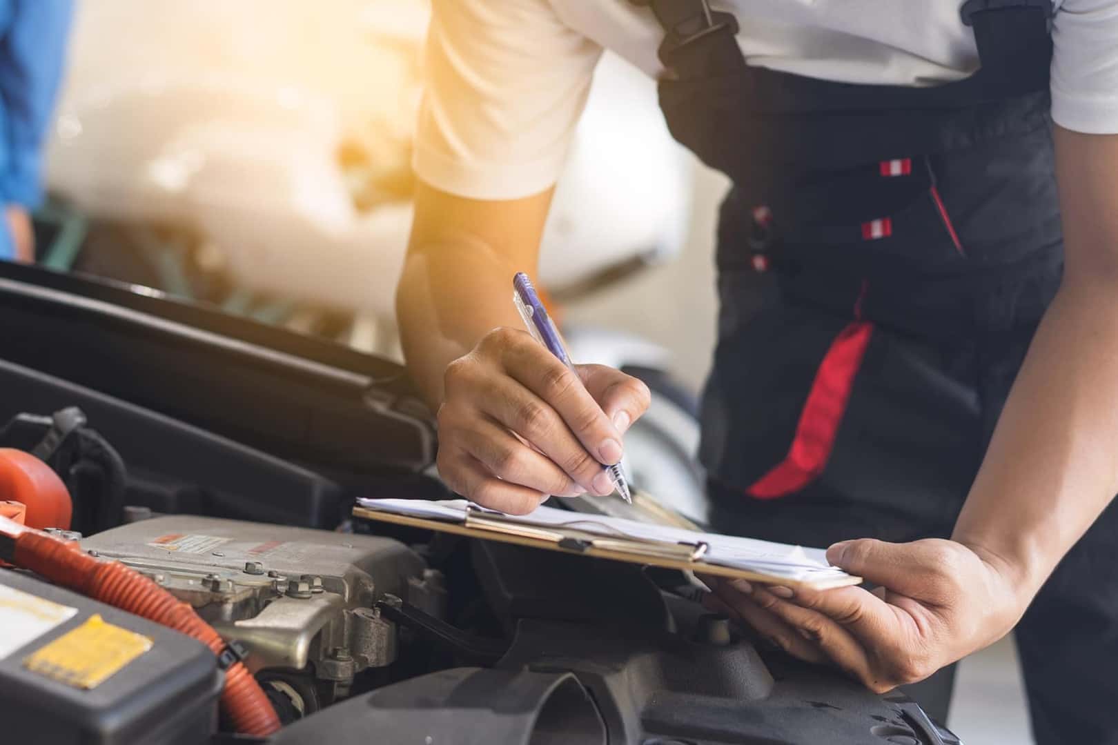 Ford Certified Technician inspecting EV vehicle