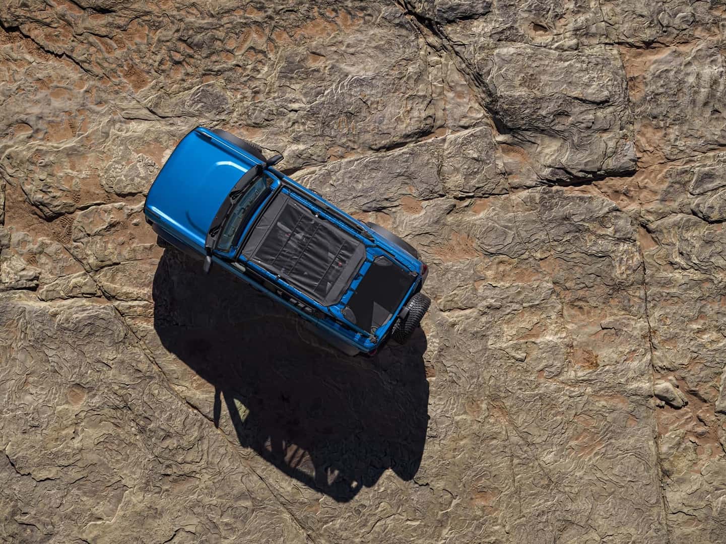 Overhead view of Ford Bronco parked in the desert