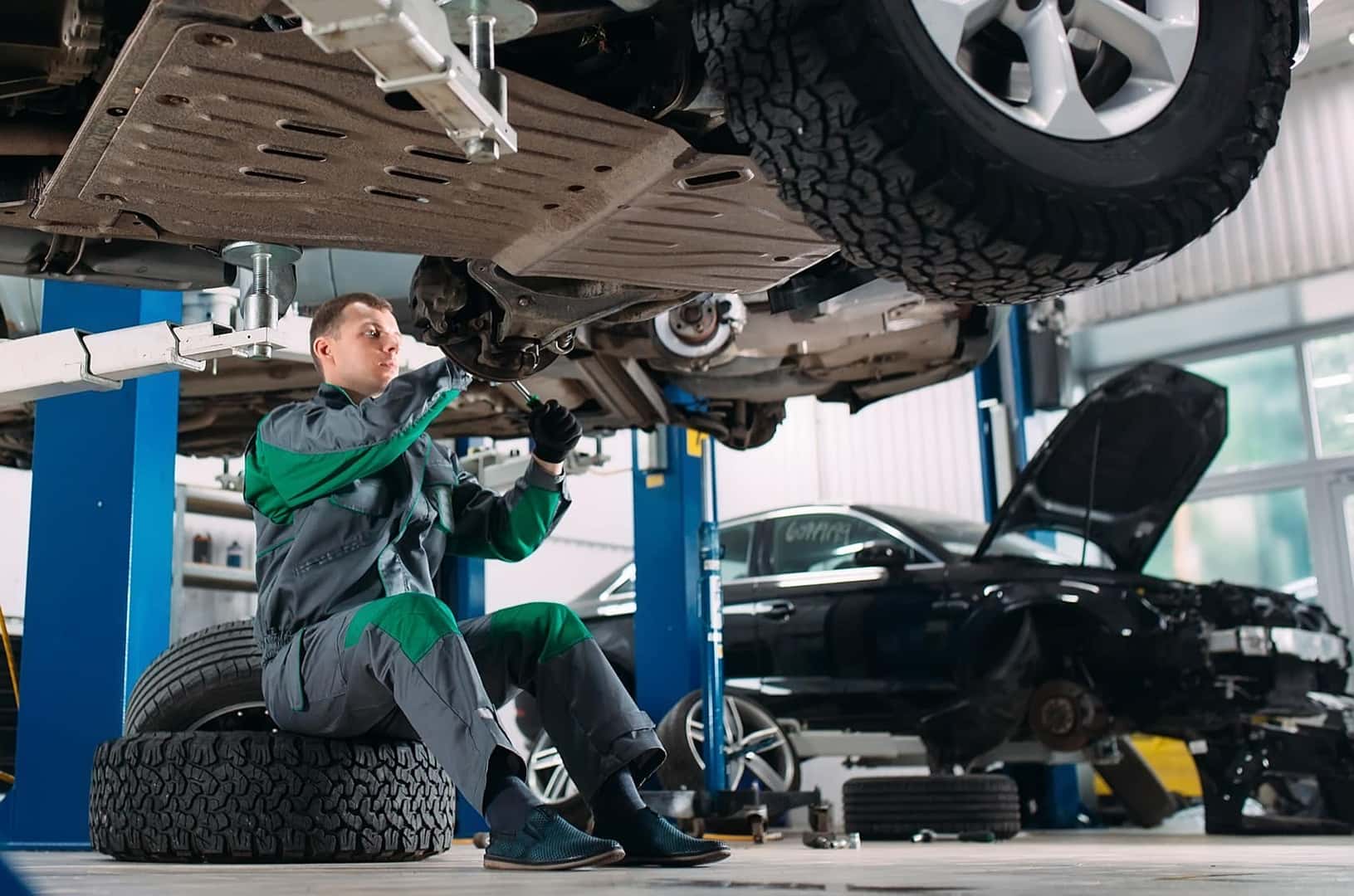 Ford Certified Technician working on Ford Super Duty in Service Center