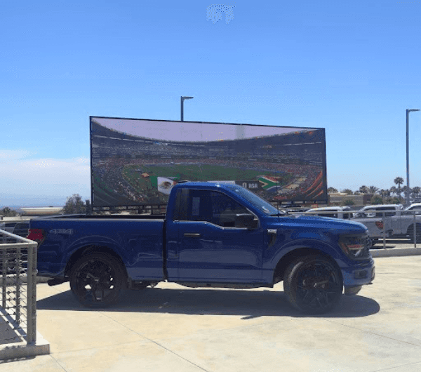 Ford of Upland big screen watch party setup