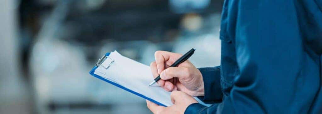service technician with checklist