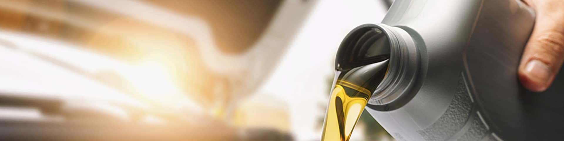 Close up view of oil being poured