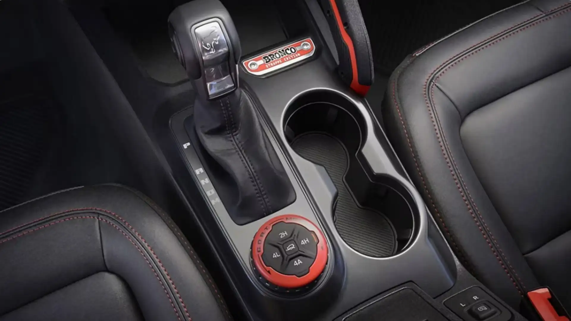 2025 Ford Bronco® interior center console with gear shifter and G.O.A.T. drive mode dial.