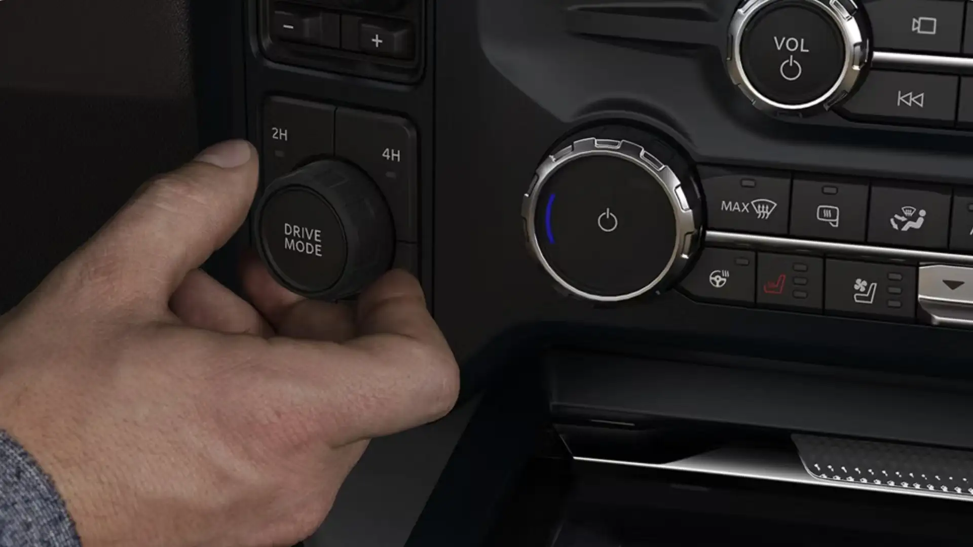 2026 Ford Super Duty® close up of drive mode knob and climate control panel.
