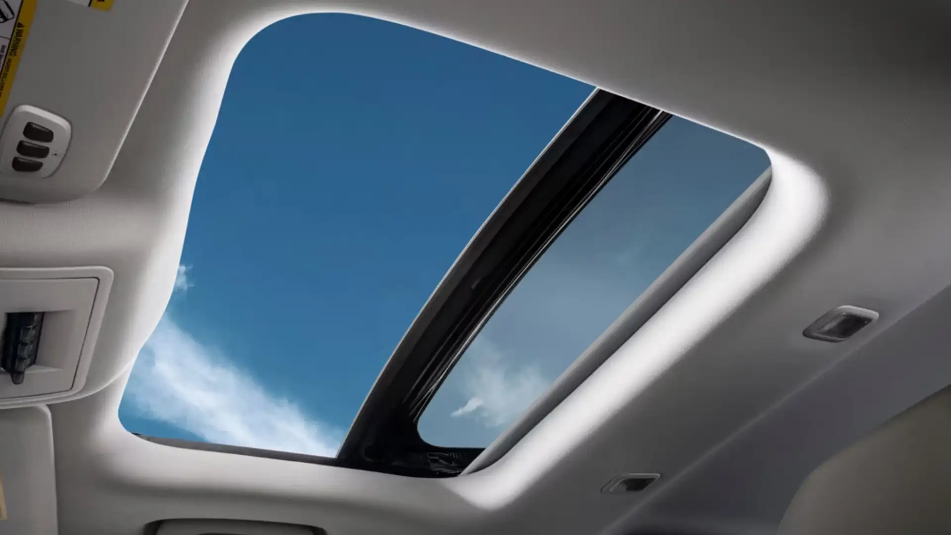 2025 Ford Bronco Sport® sunroof view showcasing clear skies, bringing fresh air and light into the cabin.