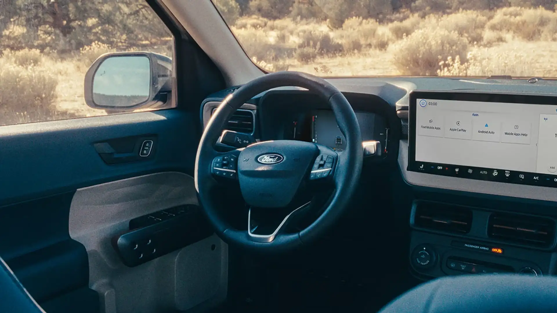 2026 Ford Maverick® dashboard with SYNC® touchscreen, digital gauges, and multifunction steering wheel.