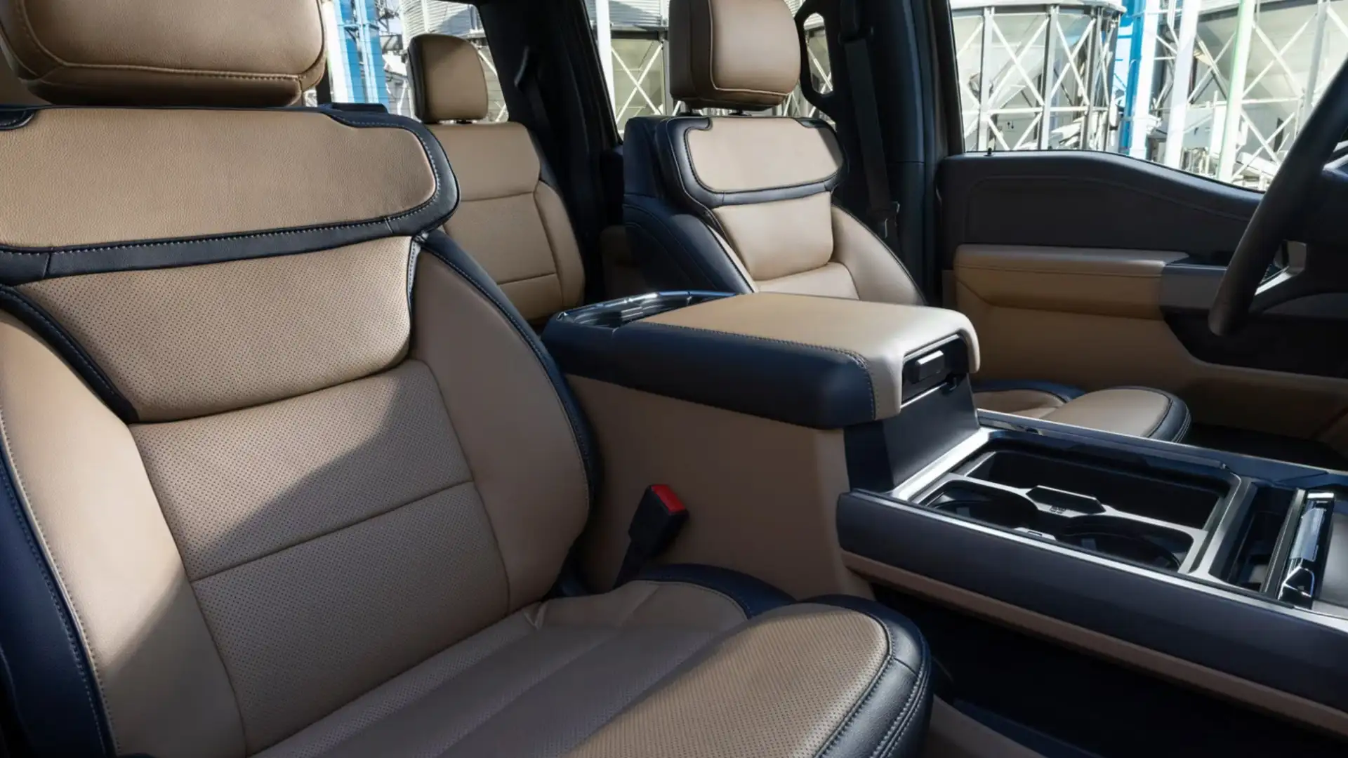 2026 Ford Super Duty® Platinum front leather seats with center console and premium trim.