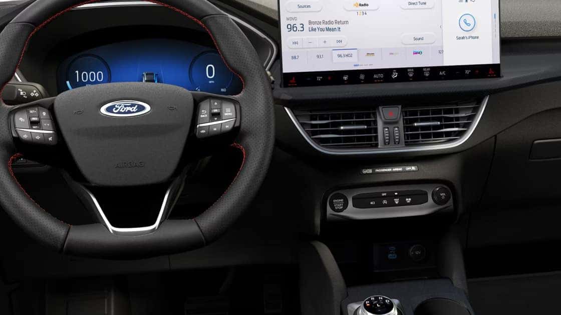 2026 Ford Escape® interior with digital gauge cluster, touchscreen display, and steering wheel controls.
