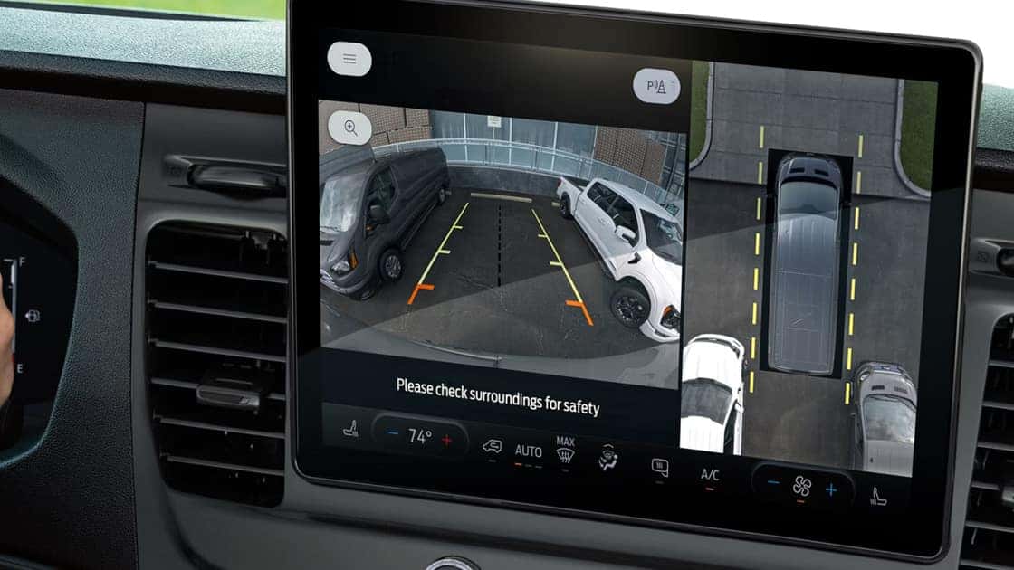 2026 Ford Transit® touchscreen displaying rearview camera and 360-degree parking assist view.