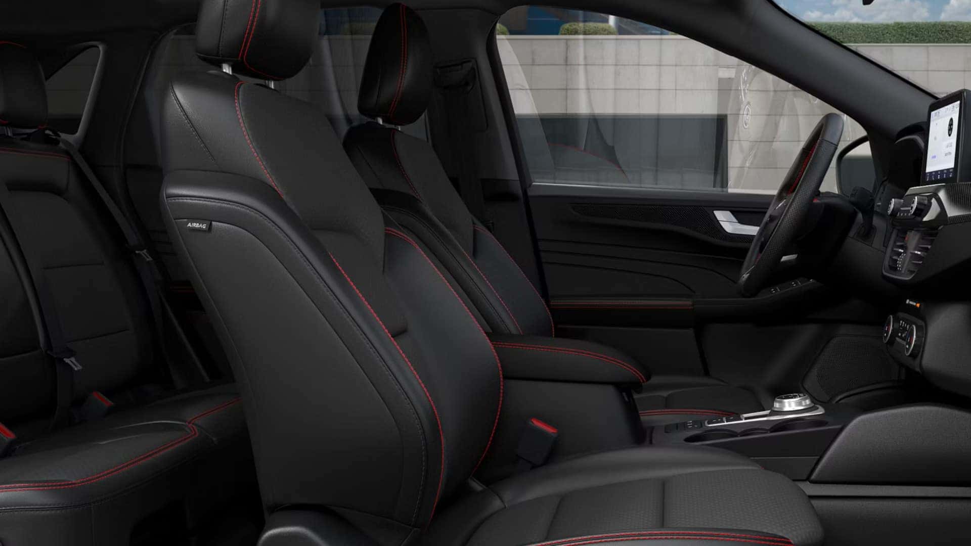 2026 Ford Escape® interior with black seats, red stitching, digital display, and modern center console.