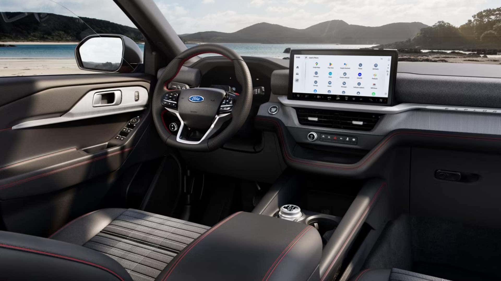 2026 Ford Explorer® interior dashboard with large touchscreen, red stitching, and premium front cabin design.