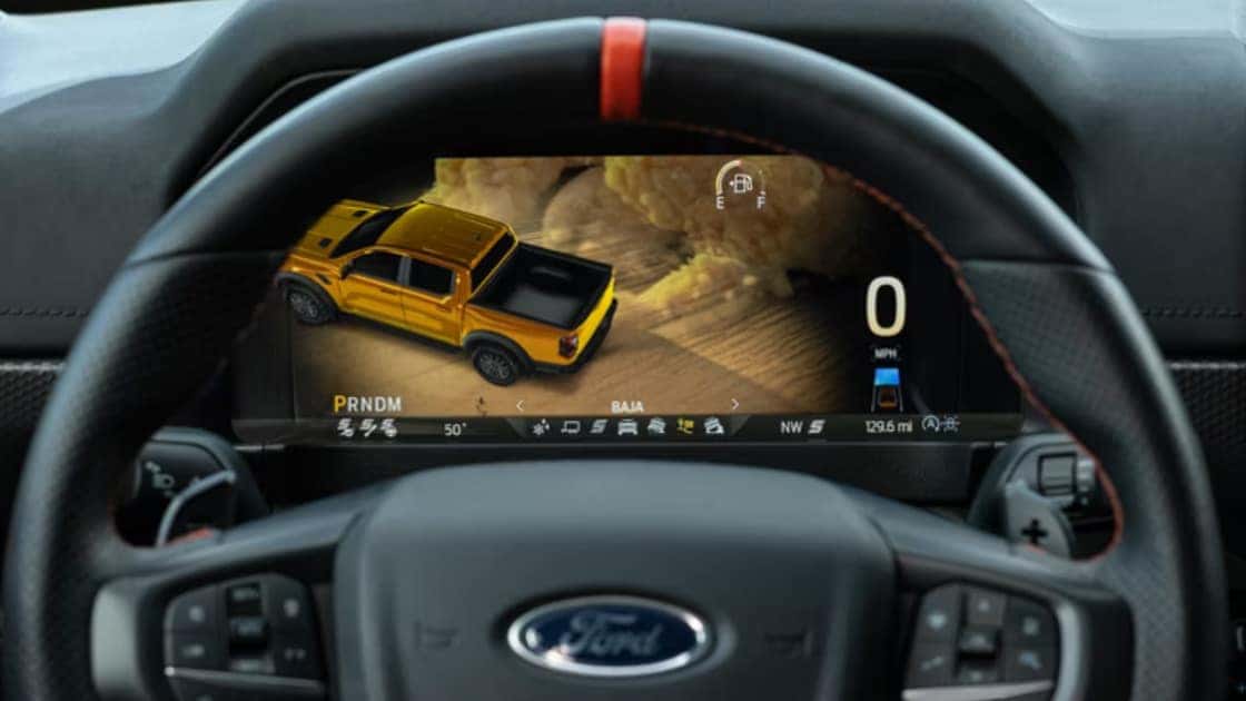 2025 Ford Ranger® digital gauge display showing off-road drive mode, speed, fuel level, and terrain graphics.