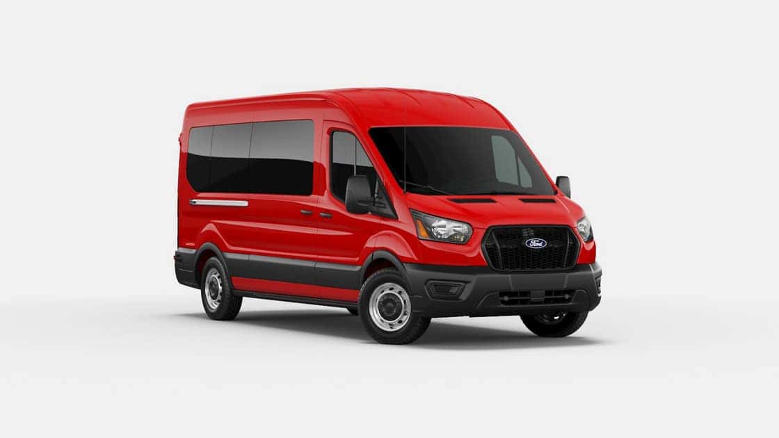 2026 Ford Transit® red passenger van shown in front studio view with tall roof and black front grille.