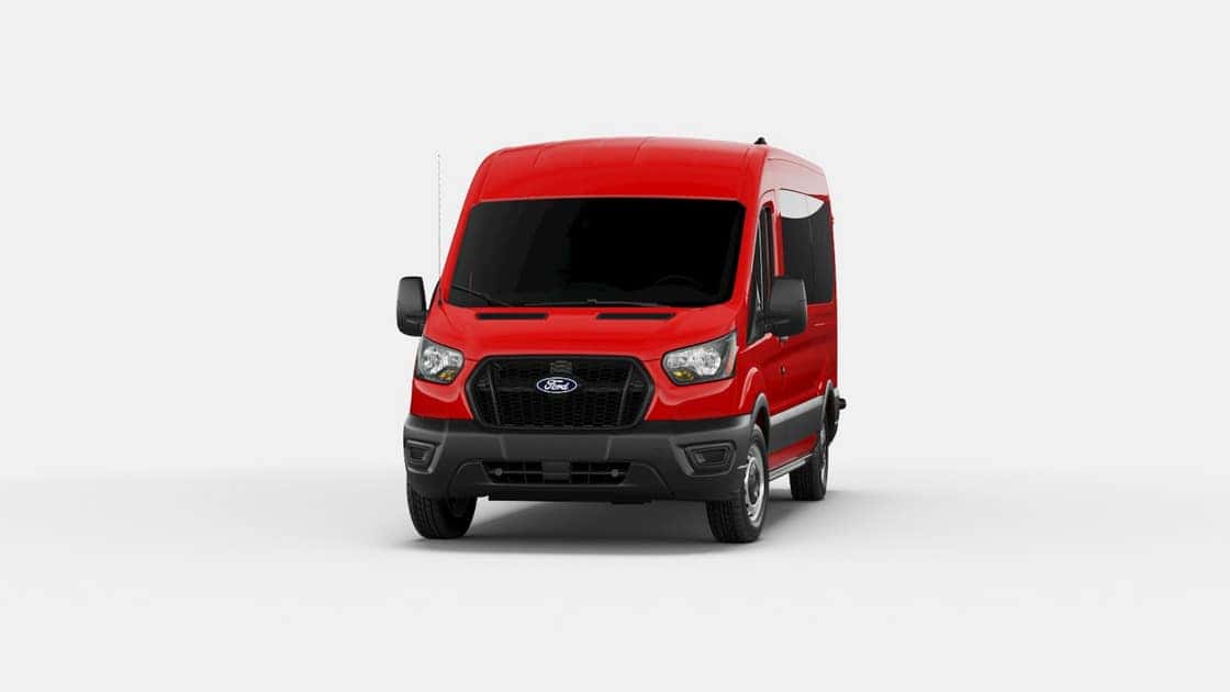 2026 Ford Transit® red passenger van shown in front studio view with tall roof and black front grille.