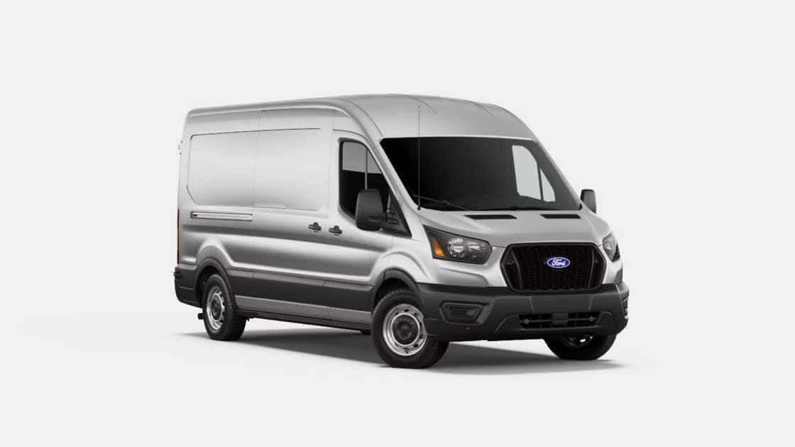 2026 Ford Transit® silver cargo van shown in a front three-quarter studio view with high roof and black grille.