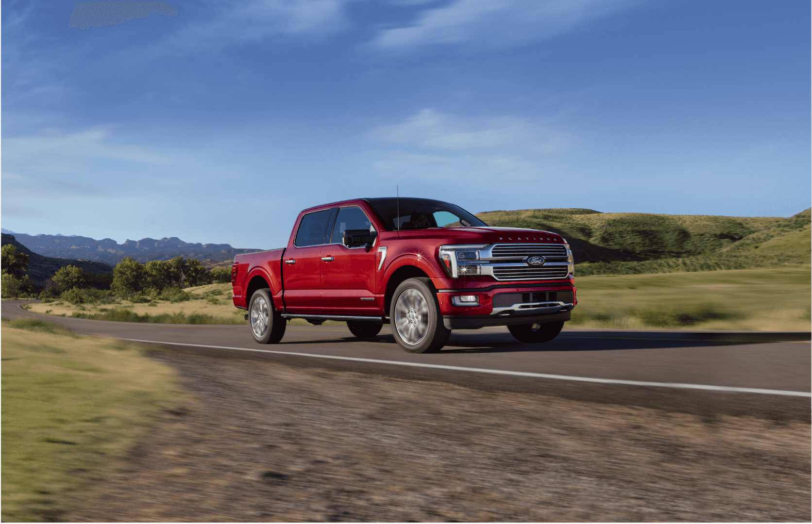 Ford F-150 driving on a rural highway in Idaho