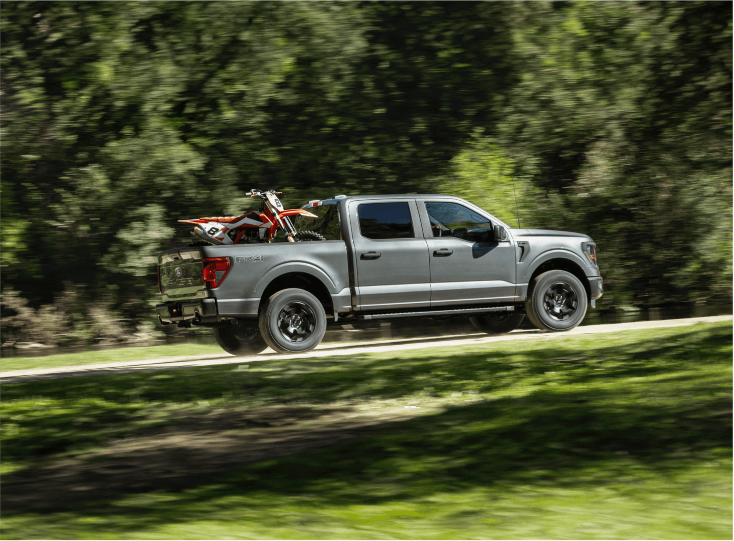 Motorbike loaded in the bed of a Ford F-150