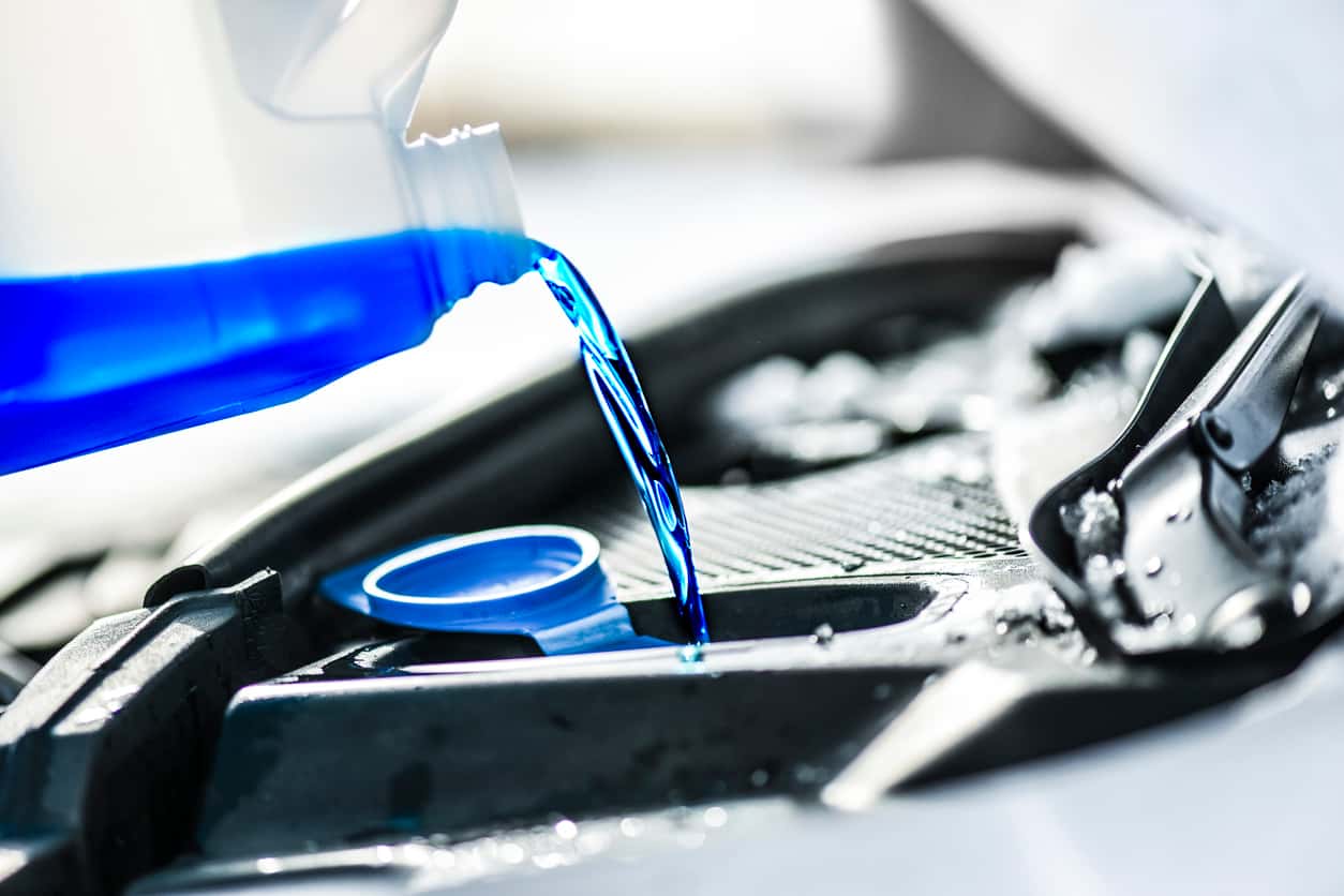 Fluid refill in car as part of summer car maintenance