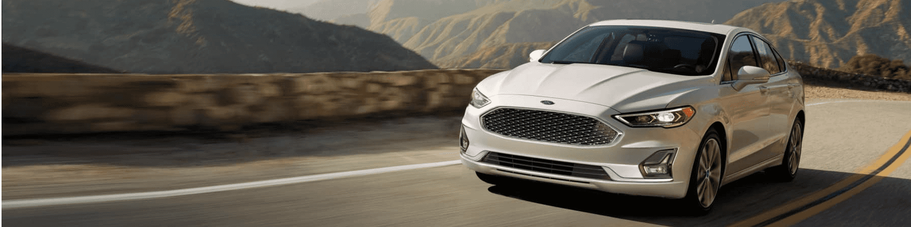 Ford Fusion Driving on Mountain Road