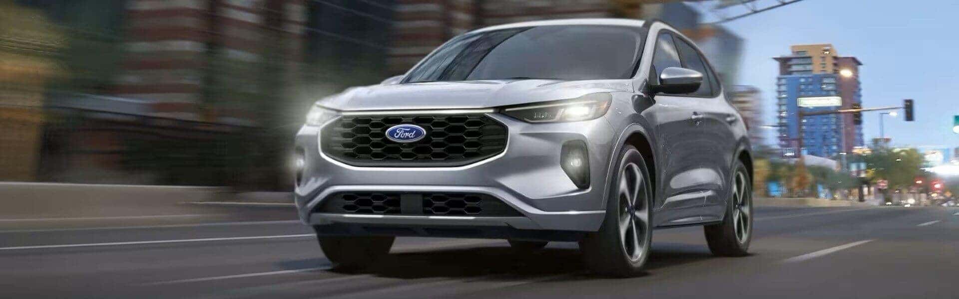 2024 Ford Escape SUV Driving Down A Street