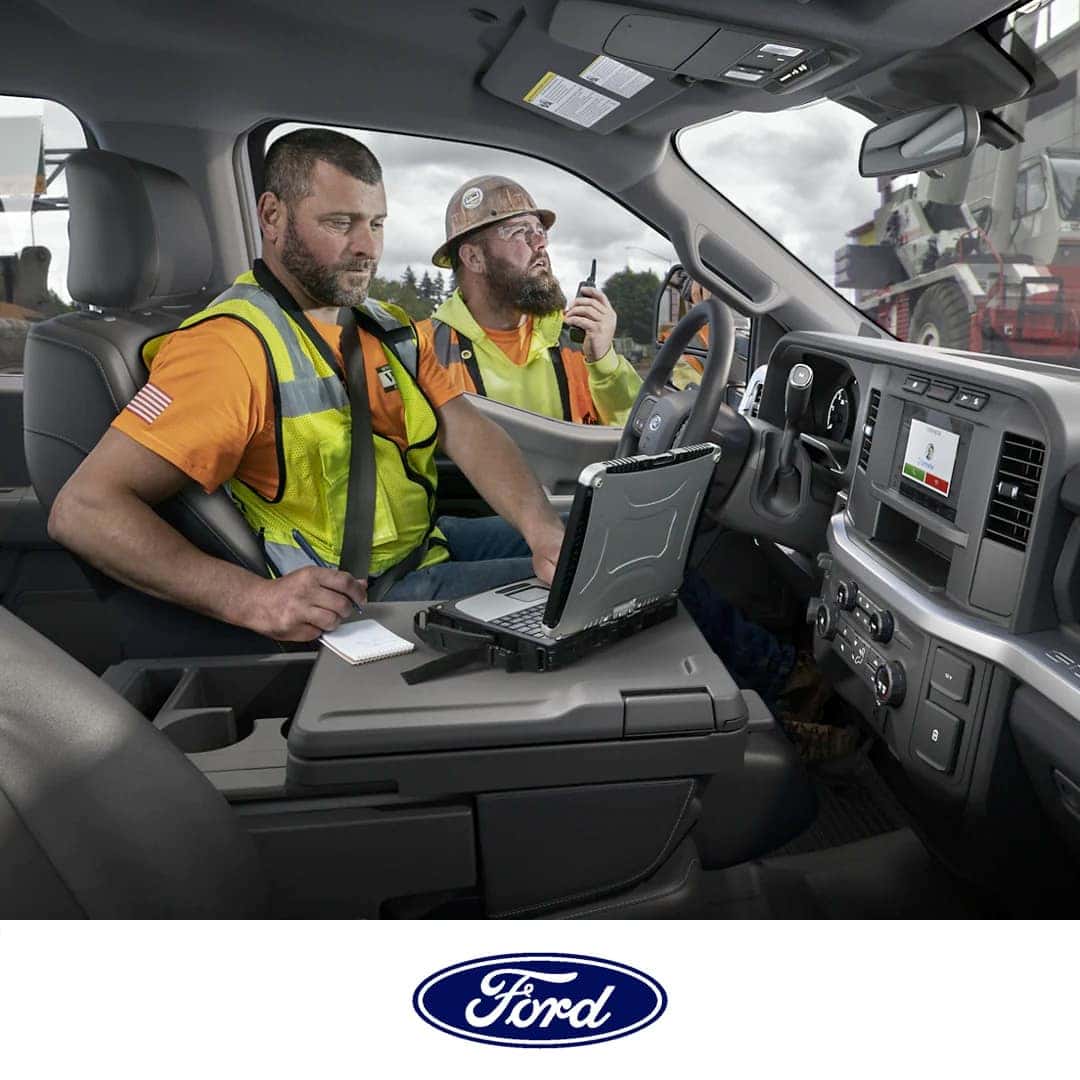2023 Ford Super Duty Interior with Workers Inside