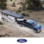 2024 Ford King Ranch Super Duty Truck Pulling a Horse Trailer on a Dirt Road